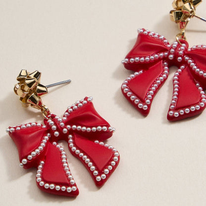Christmas Bow Enamel | Pearl Trimmed Dangling Earrings: Red / One / 4SE31079