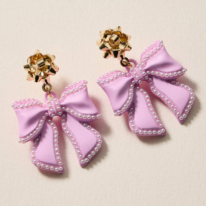 Christmas Bow Enamel | Pearl Trimmed Dangling Earrings: Red / One / 4SE31079